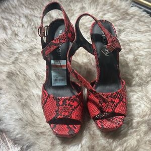 Red and black heels size 7.5